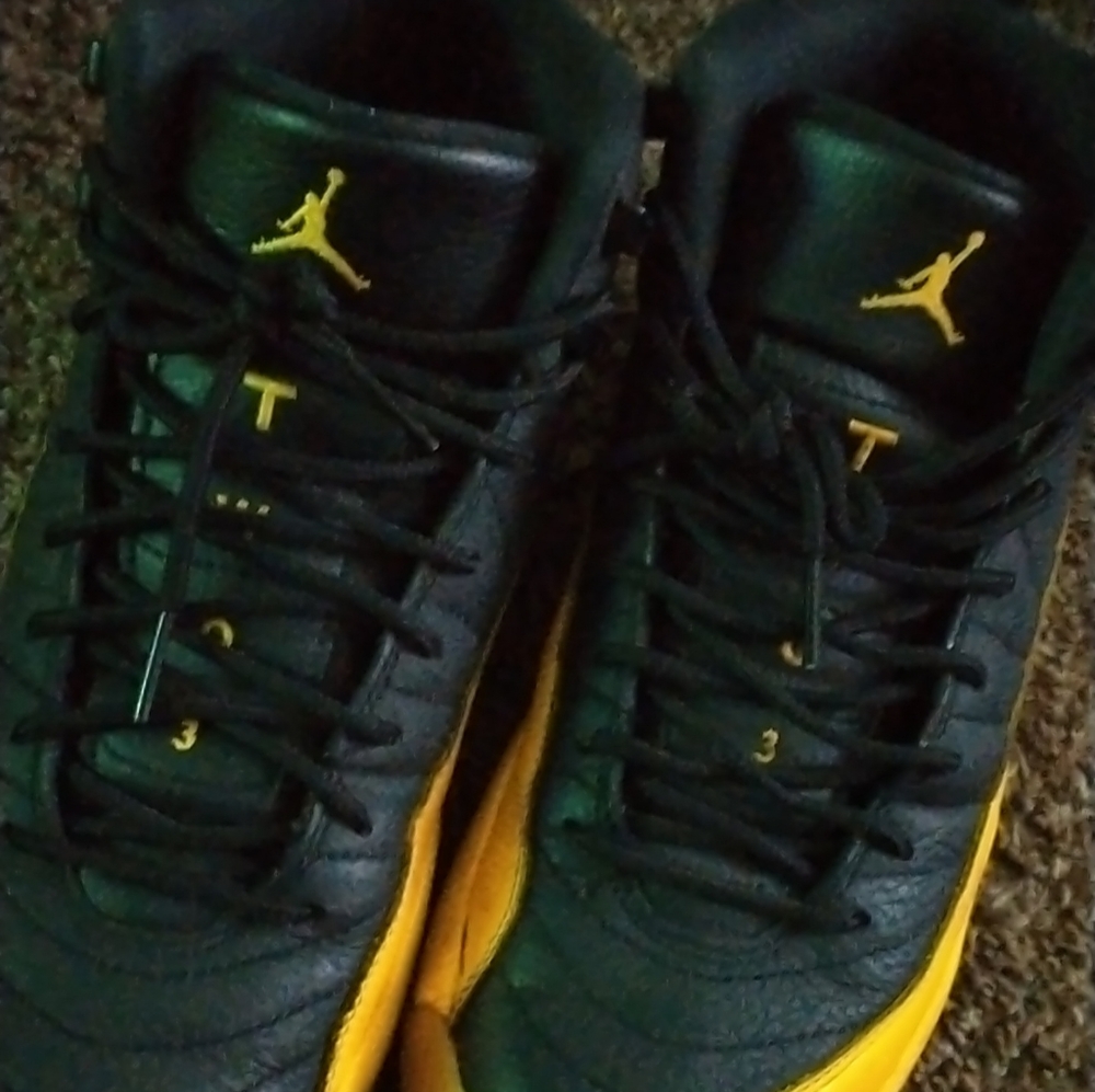 Black and yellow Jordan 12